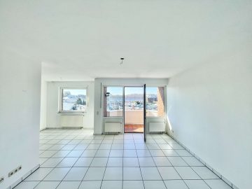 Schöne Dachgeschosswohnung in Frechen - Wohnzimmer